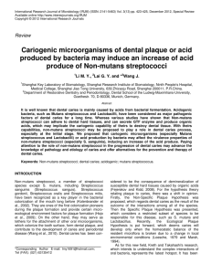 Cariogenic microorganisms of dental plaque or acid produced by