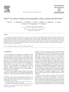 Hard X-ray phase imaging and tomography using a grating
